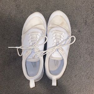 White Nike tennis shoes